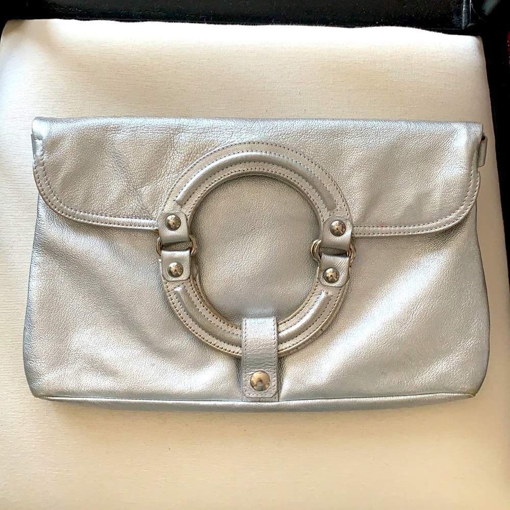 Leather. Silver convertible clutch bag. Made in NY